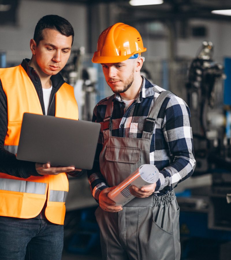 Two colleagues at a factory